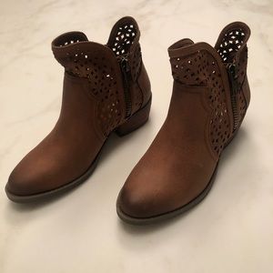 Brown booties with eyelet cutout detail